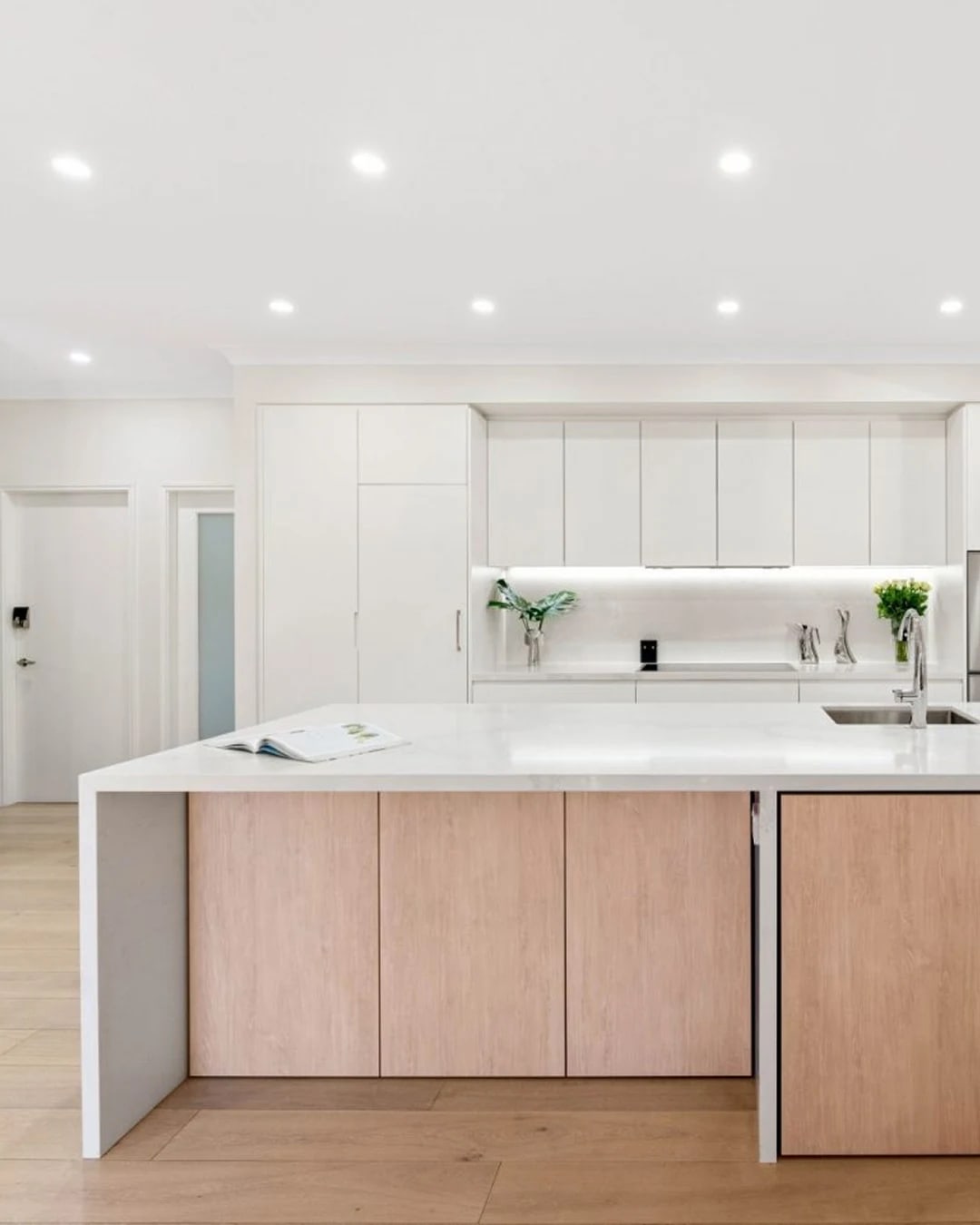 Light and airy modern kitchen featuring HW12342 Maison.